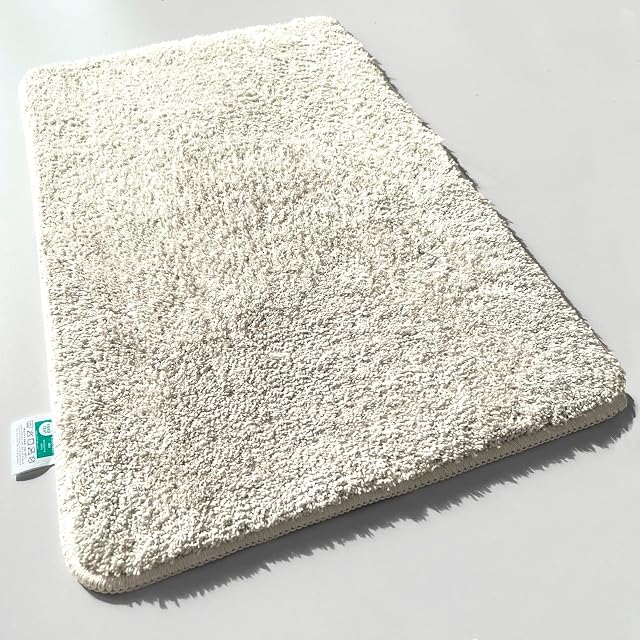 Tapis de bain microfibre à poils longs crème casa pura